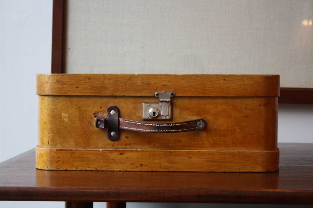 Lovely wooden suitcase made in Estonia in the 1930s, leather handle and steel lock in working order.