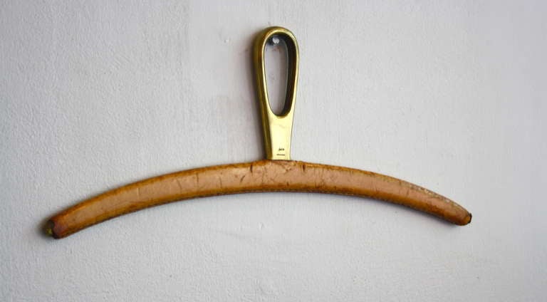 Modern Rare Leather Covered Solid Brass Hanger by Carl Aubock