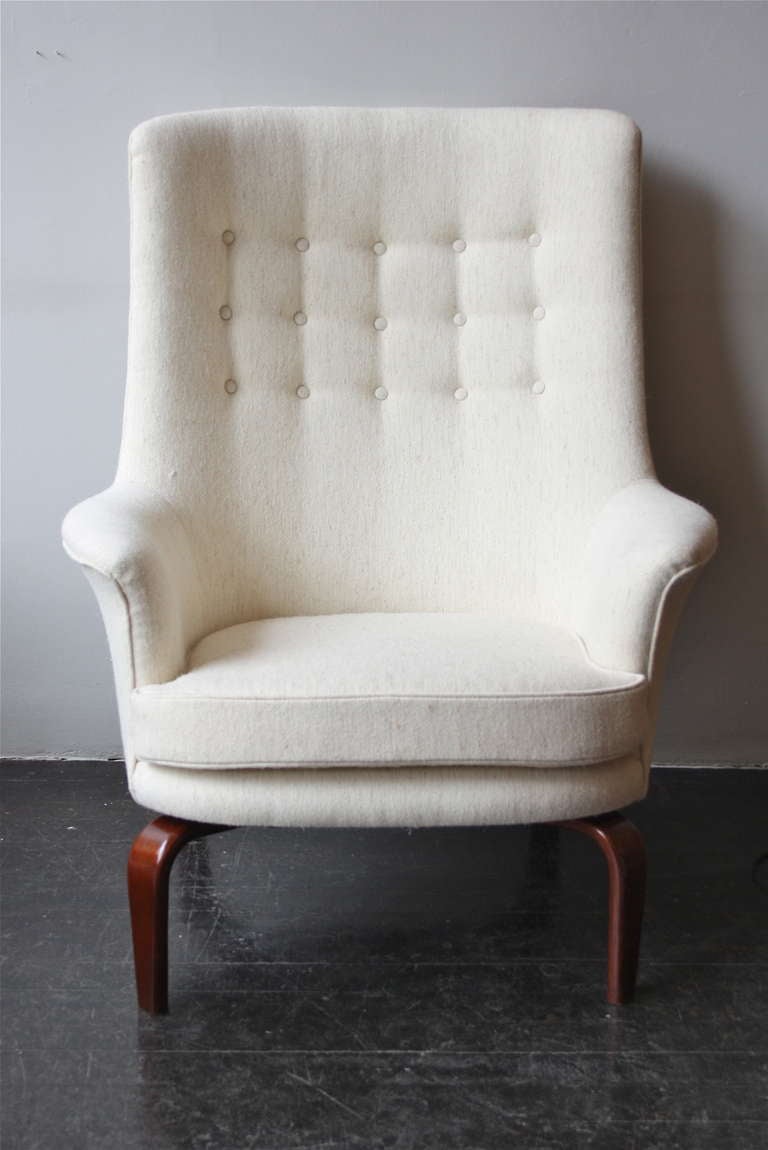 Great highback Pilot chair by Swede Arne Norell. Newly upholstered in a handwoven wool fabric.