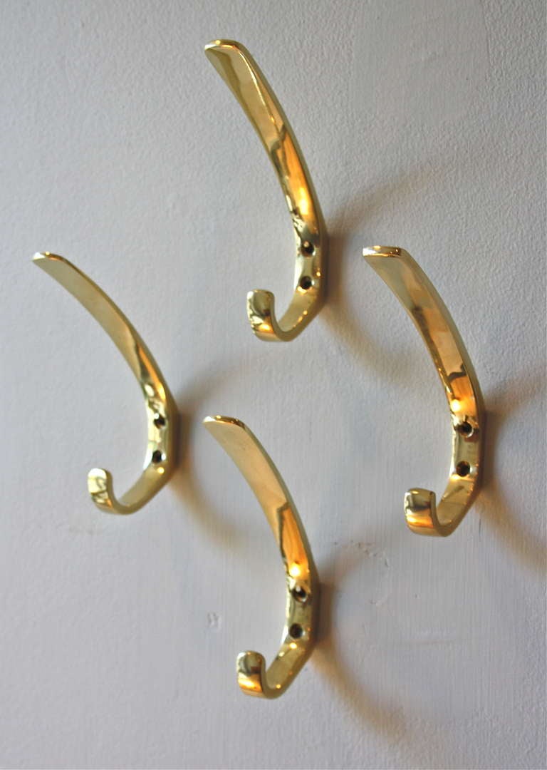 Set of Four Polished Brass Hooks by Hagenauer