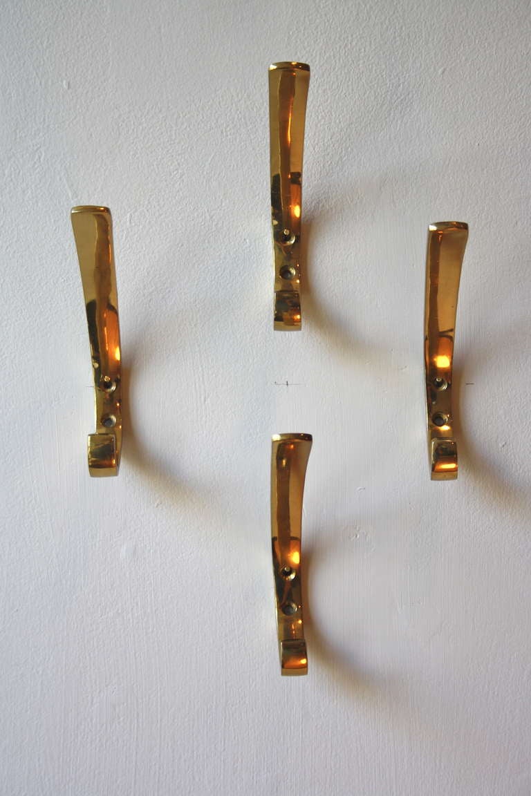Set of Four Lacquered Brass Hooks By Hagenauer
