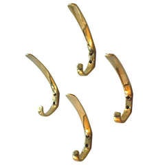 Set of Four Polished Brass Hooks by Hagenauer