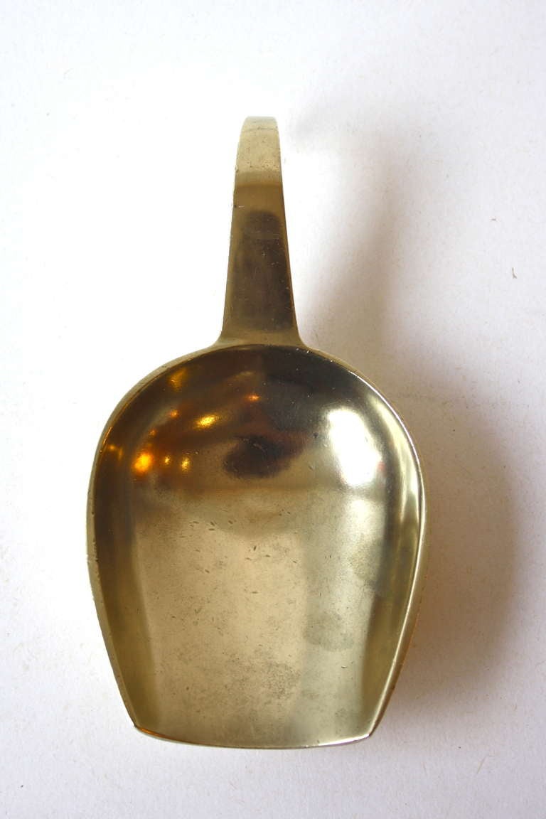 Beautiful solid brass sweetscoop by Carl Aubock