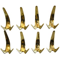 Seven Sculptural Double Hooks by Carl Aubock
