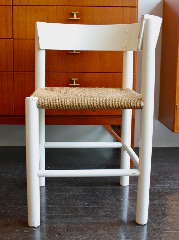 Pair of white painted chairs with papercord seats by Mogens Lassen made by Fritz Hansen