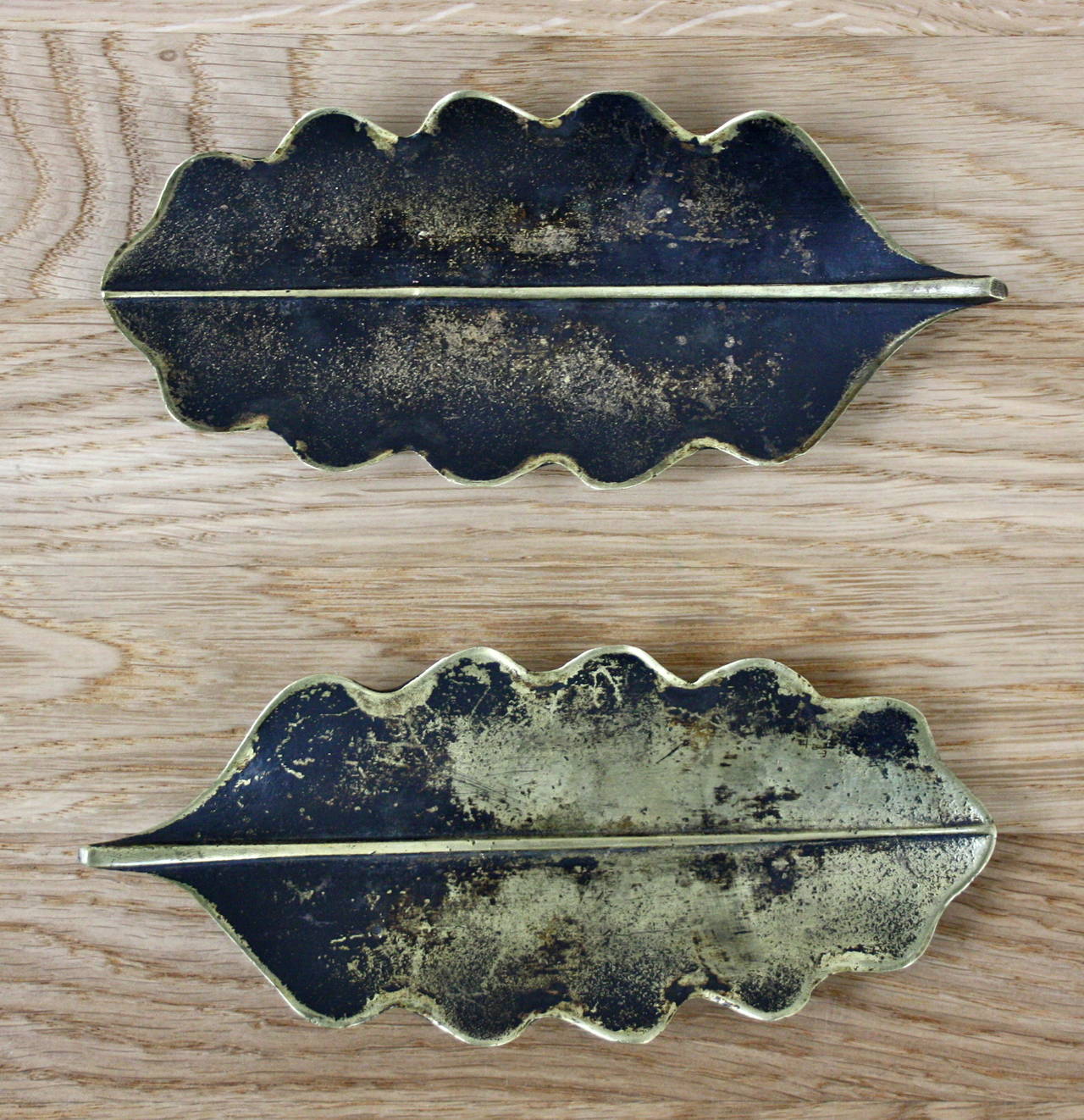 Pair of part patinated brass ashtrays by Carl Auböck.