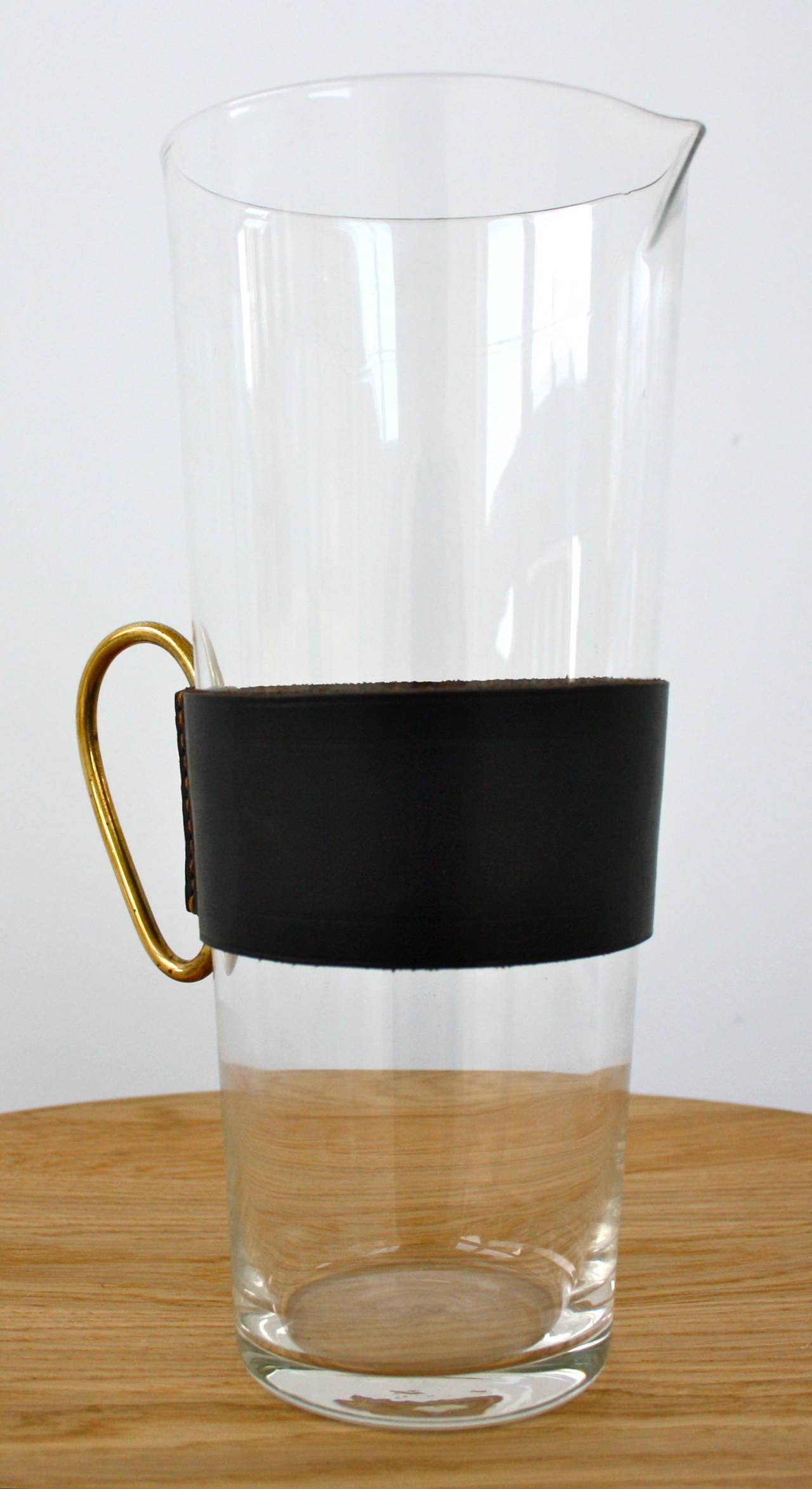 Austrian Carl Aubock Large Glass Jug with a Leather Sleeve and a Brass Handle