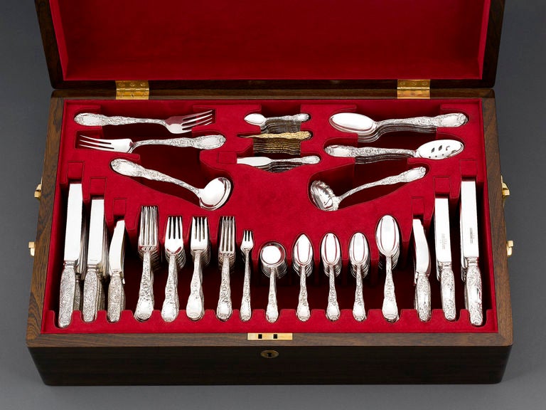 An exceptional 208-piece Tiffany & Co. antique sterling flatware service for 12 in the highly desirable <em>Chrysanthemum</em> pattern, nestled in its mahogany chest. Introduced in 1880, the <em>Chrysanthemum</em> pattern is considered among