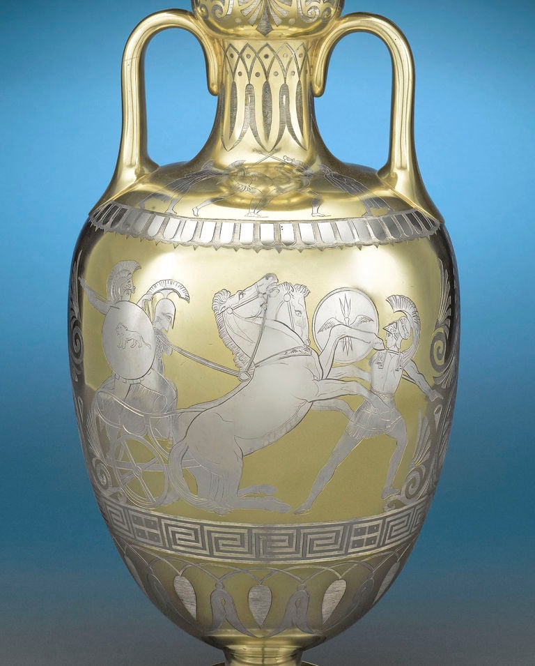 This exceptional Victorian parcel-gilt silver vase by Daniel and Charles Houle depicts scenes from the Greek fable the Judgment of Paris, in which Trojan youth Paris chooses Aphrodite as the fairest goddess resulting in a tragic consequence, the