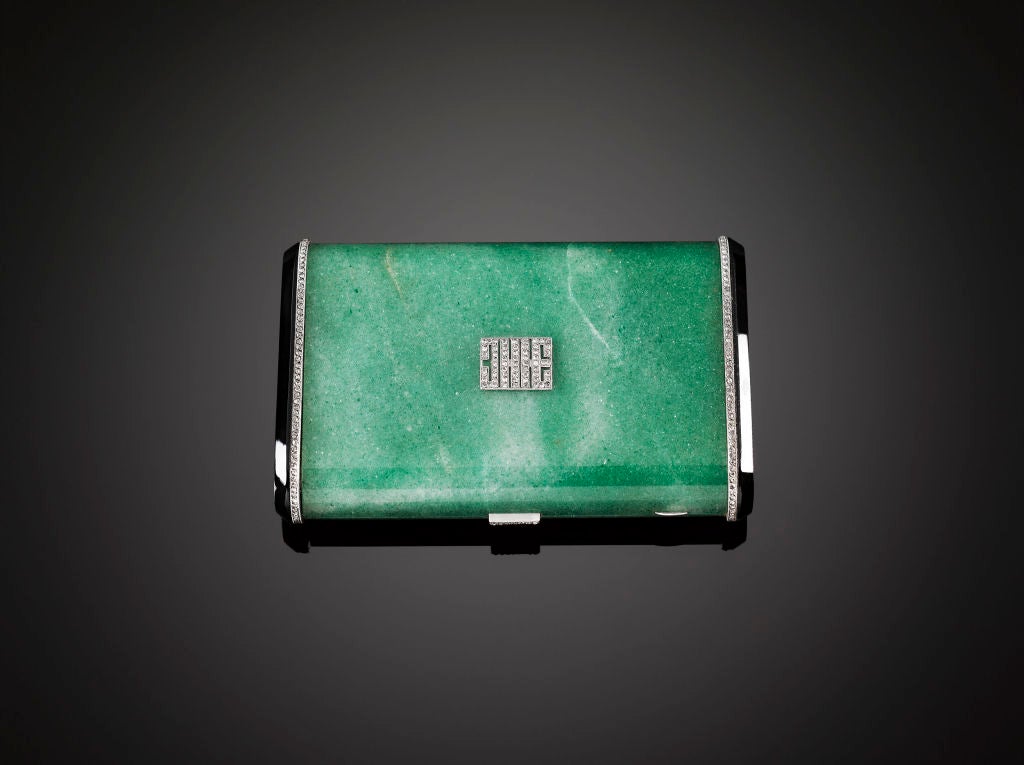 The intoxicating beauty of aventurine is perfectly captured in this exquisite Lacloche Frères minaudiere, or compact. Crafted of fine gold, this compact is adorned on the top and bottom with solid aventurine. This precious stone exhibits a subtle