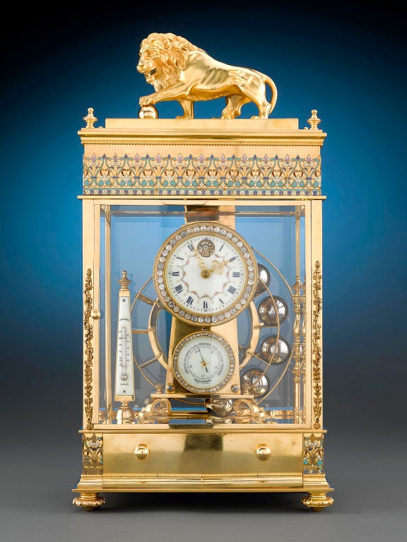 This extraordinary antique French Ferris wheel crystal regulator clock is as much a mechanical wonder as it is a work of art. An example of stunning French workmanship, the ball-driven mechanism is housed within a case of glass and luxurious gilt