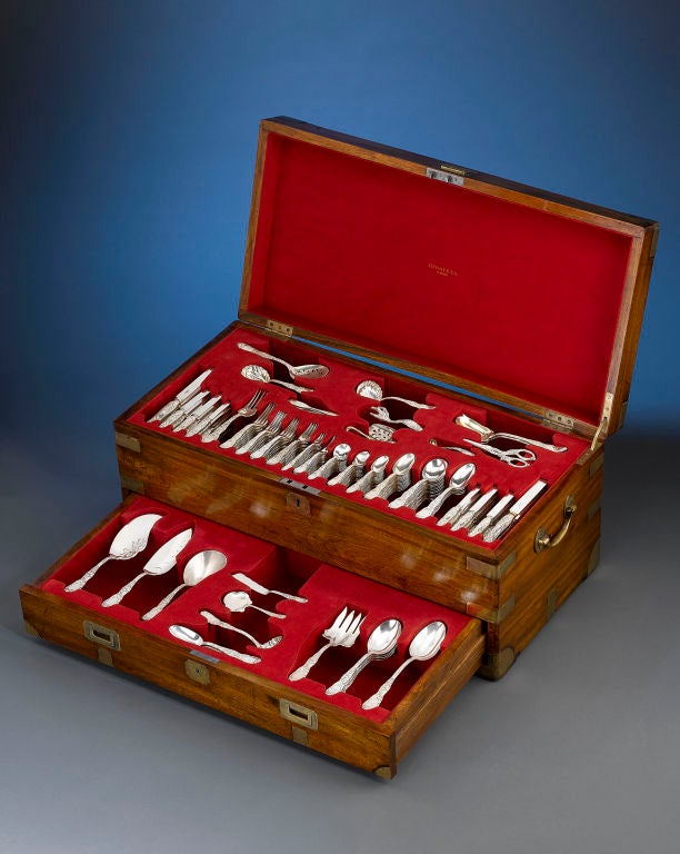 The sheer brilliance of workmanship displayed in this antique 219-piece Chrysanthemum silver flatware service embodies the essence of the Tiffany & Co. name. Each piece bears the intricate motif of its namesake flower, and is nestled in its original