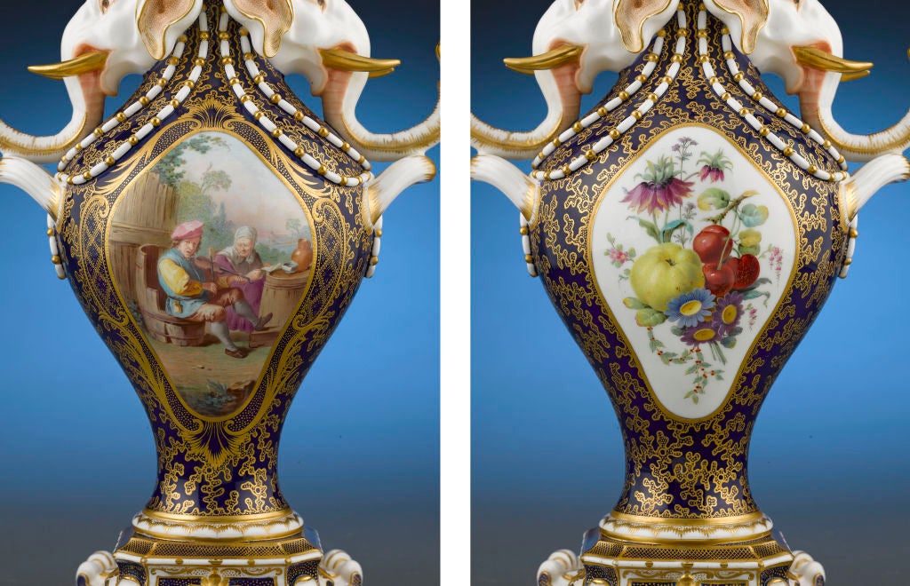 These most extraordinary vases by Minton are known as vases à tête d'éléphant or Elephant vases, and are a revival of the Sèvres pair created for Louis XVI. Boasting two majestic elephant's heads apiece, each vase also exhibits marvelous gilding and