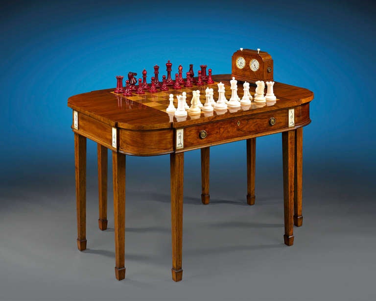 This important and unique chess set crafted by Jaques & Son Ltd. of London for the Mexican General Joaquin Amarro. Comprised of African ivory pieces carved in the universally-recognized Staunton design, a classically-styled inlaid rosewood table and
