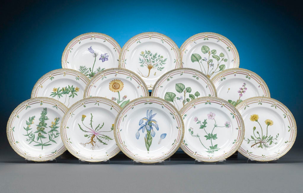 This beautifully crafted set of 12 dinner plates exhibits the highly regarded Flora Danica pattern. Crafted by the Royal Copenhagen Porcelain Manufactory, these plates feature the meticulous and refined artistry for which Flora Danica is so