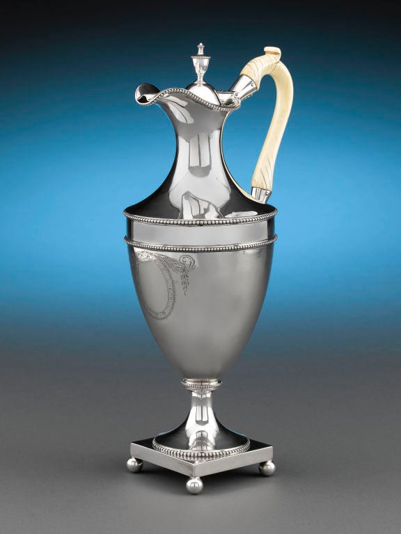 This important and superbly crafted silver coffee pot by Georgian silversmith Hester Bateman displays the superior quality and proportion for which she is known. Crafted in a classical urn shape, this elegant pot boasts Bateman’s signature delicate,