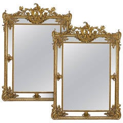 Paire de miroirs en bois doré de style Louis XV Revive