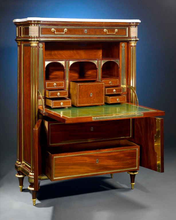 This most extraordinary secrétaire à abattant by Bernard Molitor displays superb proportion and balance. Beautifully crafted of mahogany with ormolu mounts and accented by a fine white marble top, the secrétaire features a fall-front that opens