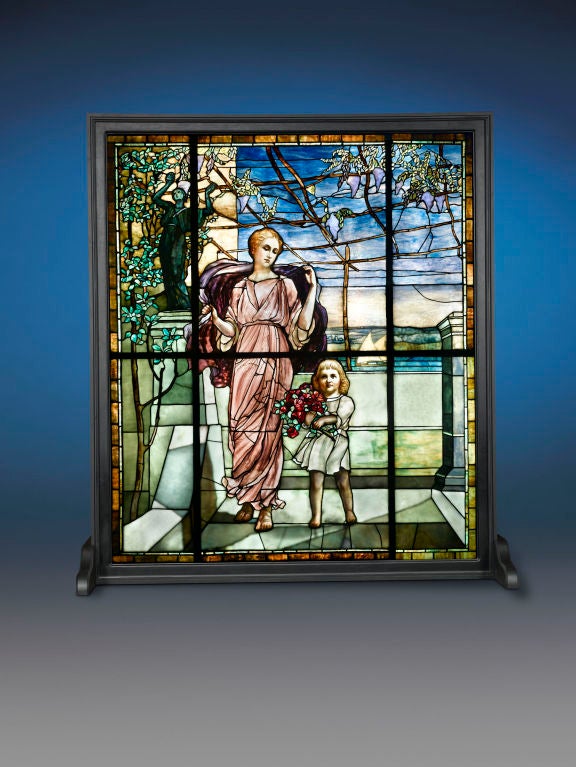 Magnificent and technically breathtaking, this remarkable stained glass window by Tiffany Studios secures Louis Comfort Tiffany's reputation as a master artist and innovator. Though he was known as a pioneer in the Art Nouveau movement, crafting