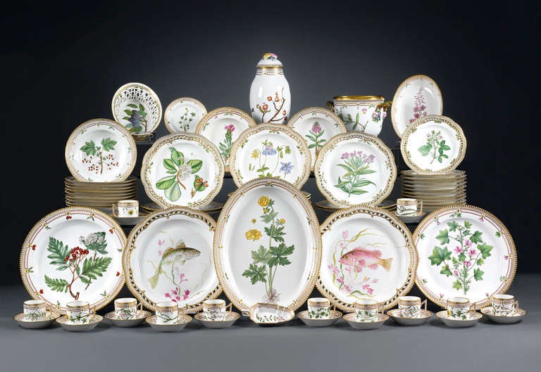 This remarkable 82-piece <em>Flora Danica</em> dinner service was crafted by the Royal Copenhagen Porcelain Manufactory, in what is regarded as one of the most prestigious and stunning porcelain patterns ever created. This service for 12 is not only