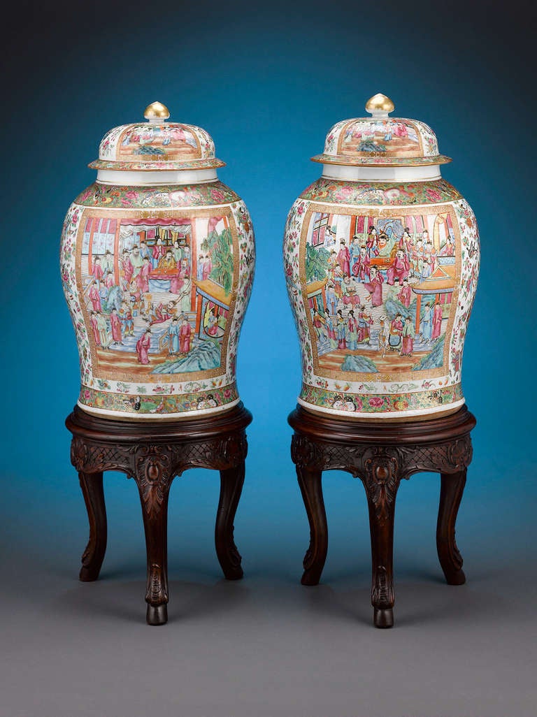 This enchanting pair of Chinese export rose medallion covered jars exhibits magnificent artistry and detail. Also known as potiches, these monumental jars are adorned with highly detailed hand-painted scenes of courtly life, populated with