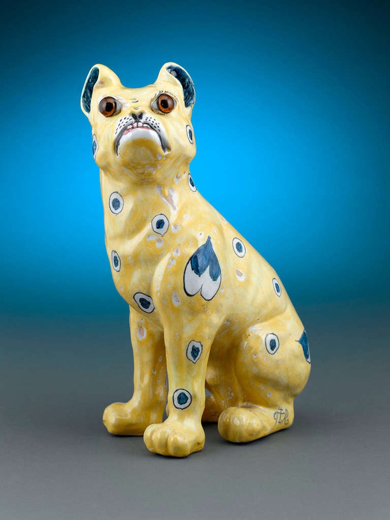 This incredible faïence pottery pug was created by Émile Gallé during the early years of his career. Though he is known best for his famed art glass, Gallé came from a family of potters, and he explored this medium with a wonderful proficiency. The