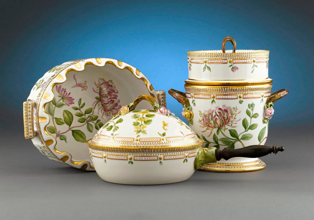 This remarkable 139-piece <em>Flora Danica</em> dinner service was crafted by the Royal Copenhagen Porcelain Manufactory. Distinguished by rich, hand-painted motifs depicting a vast array of flowering plants and marine life, this set reflects the