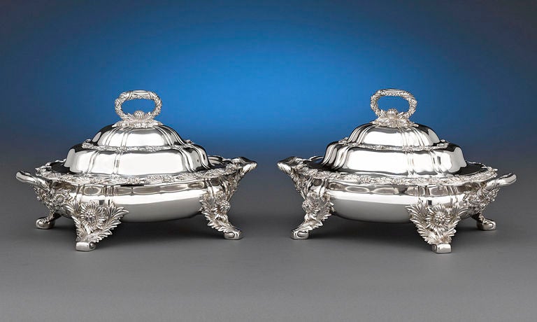 These exceptional silver covered entrée dishes by Tiffany & Co. are crafted in the highly desirable Chrysanthemum pattern. This exuberant motif’s signature flowers grace the dishes from the looped handles to the charming scrolled feet. Chrysanthemum