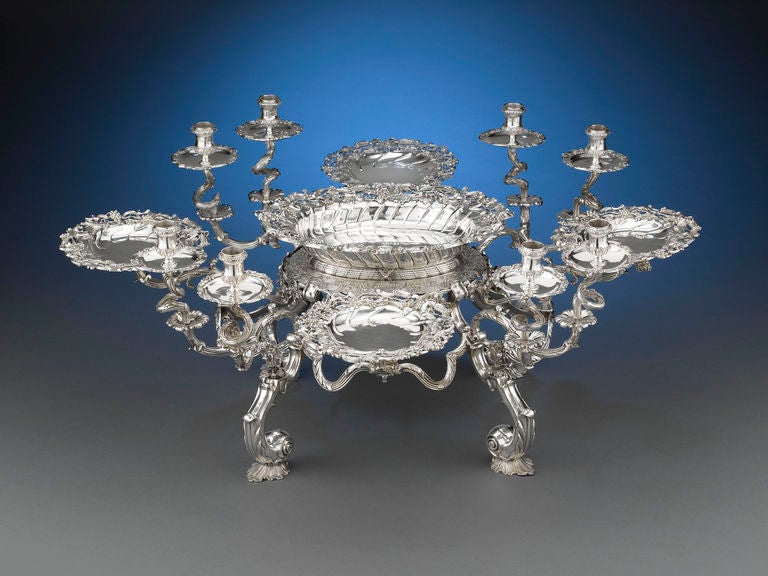 This phenomenal 18th-century antique English silver epergne is regarded so highly for its craftsmanship and type that it was once part of the legendary Al-Tajir Collection of gold and silver. Created during the reign of King George II (1727-1760),