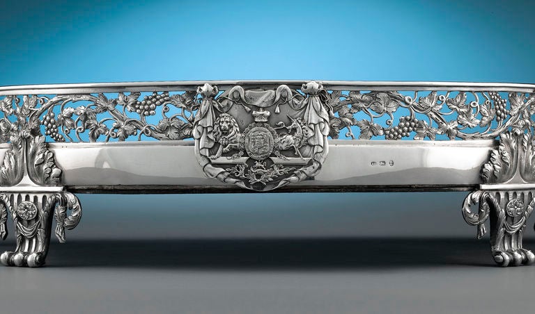  This extraordinary George III silver plateau bears the coat of arms of Prince George Augustus Frederick, the future King George IV. Crafted by London silversmith Joseph Preedy, this magnificent three-sectioned plateau is indicative of George's