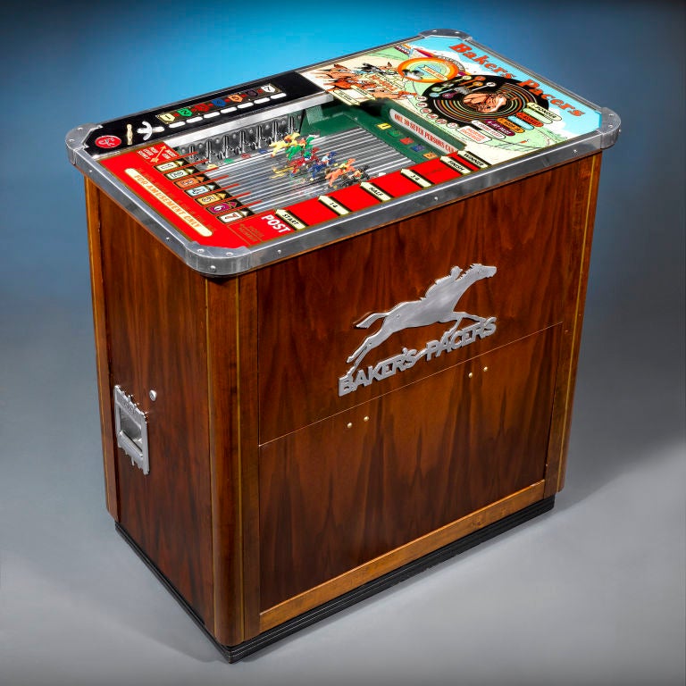 An extraordinary Baker’s Pacers coin-operated horse racing machine produced by the Baker Novelty and Manufacturing Company of Chicago. Known as a “long case” model, this elegant machine allows a customer to place nickel bets on up to seven