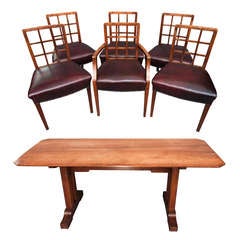 A Betty Joel Walnut Dining Suite Comprising of a Dining Table and 6 Chairs