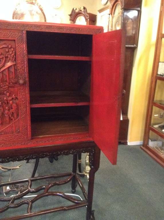 20th Century Chinese Red Lacquer Cabinet on Rosewood Stand