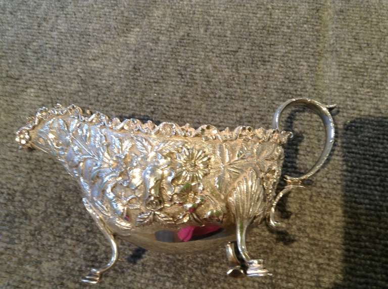 Very handsome  Sterling Sauce/Gravy Boat by S Kirk & Son in a beautiful Repouse design. The underneath is clearly marked and also has 925/1000 and NOT the word Sterling which clarifies it is an early piece of silver. This is a particularly handsome