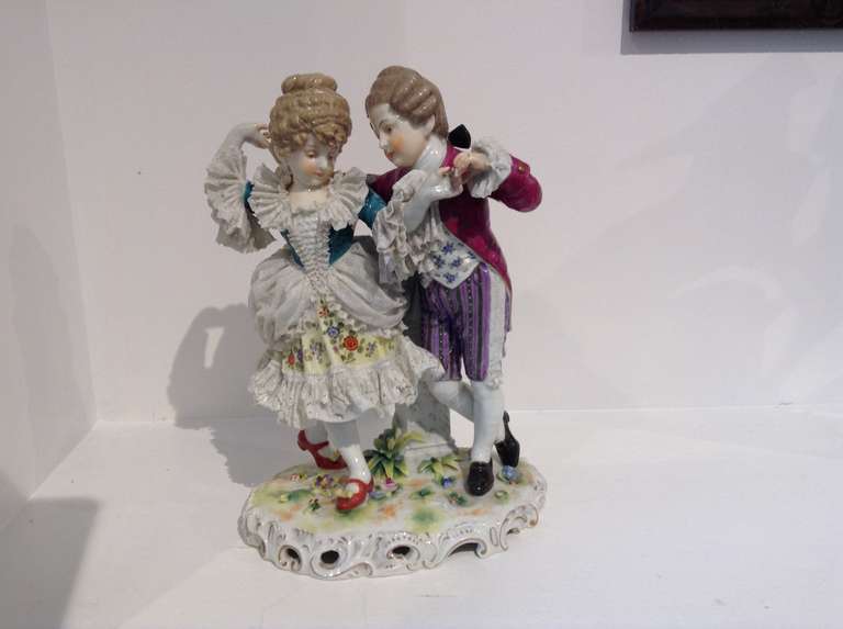 Beautiful double Royal Vienna early 19th century figurine. Marked underneath as shown in the pic with the beehive mark.