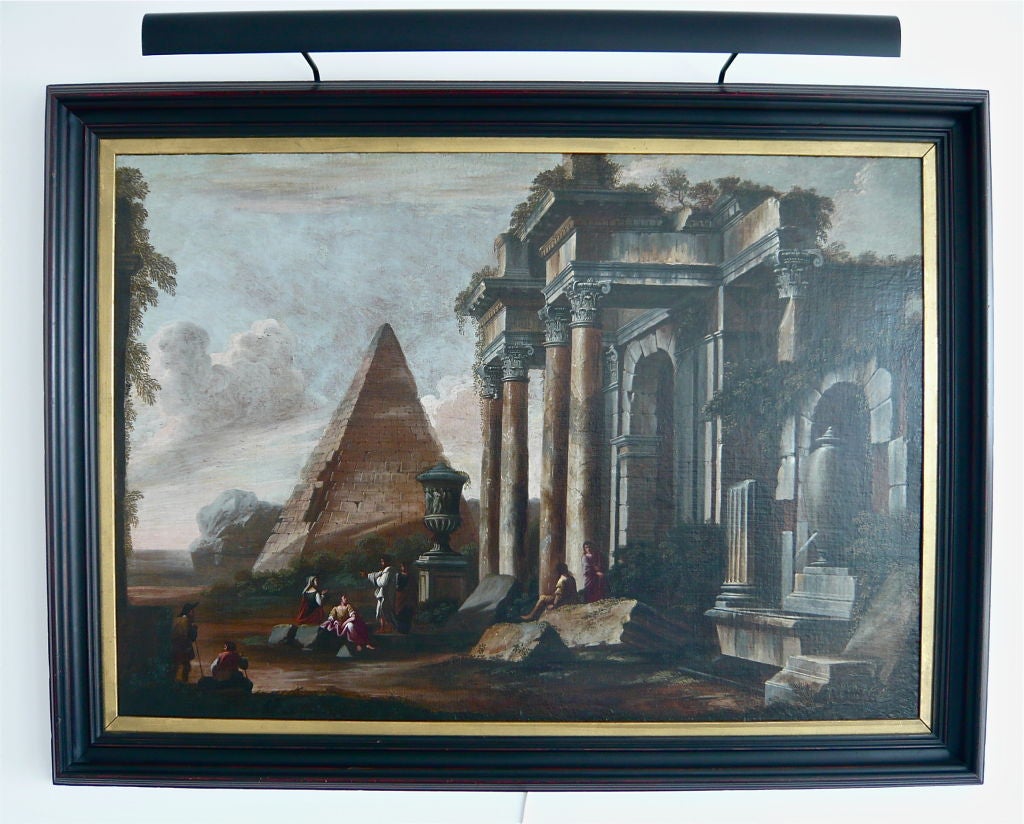 A magnificent and very impressive Italian Architectural Capriccio - With Figures By The Pyramid of Caius Cestius - circa 1725.  School of Giovanni Paulo Pannini (Italian 1691-1765).  Oil on canvas.  Large scale.  Impressive size.  Great color.  Very