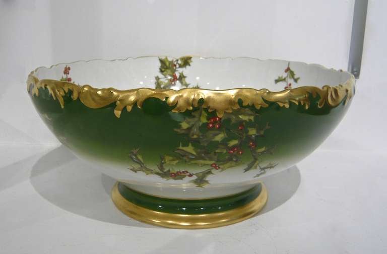 Wow!  An incredible Limoges punch bowl, circa 1910, in the Holly pattern by Tressemanes & Vogt, which later became Reynaud.  Fully hallmarked T&V Limoges.  Fabulous centerpiece.  A stunning addition to holiday decor.  Rare!