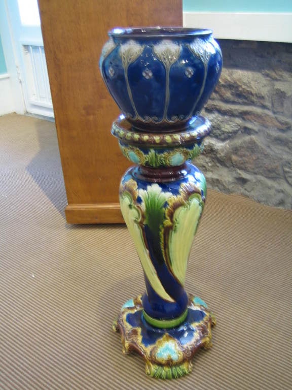 FABULOUS ROYAL DOULTON ART NOUVEAU JARDINERE - CAN ALSO BE USED WITH THE NEXT ITEM - MAJOLICA PEDESTAL BASE - THE COLORING IS VERY COMPLEMENTARY AND A VERY GOOD MATCH. THE JARDINERE HAS AN IMPRESSED ROYAL DOULTON MARK AS SHOWN IN THE PHOTO.