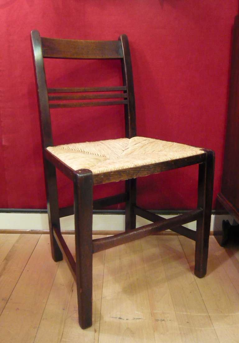 A nice pair of early English Victorian country chairs, circa 1840, with rush seats.