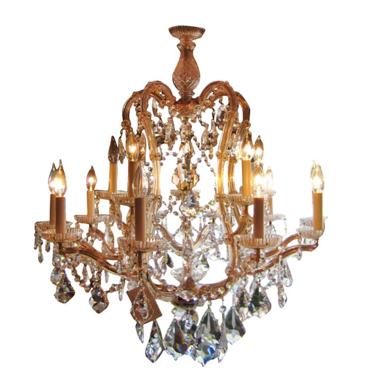 Wonderful large crystal chandelier made by Strauss consisting of two tiers. The bottom tier has ten arms and the higher tier has five arms. The crystals are all from Austria and this chandelier sparkles like crazy - an exceptionally fine quality.