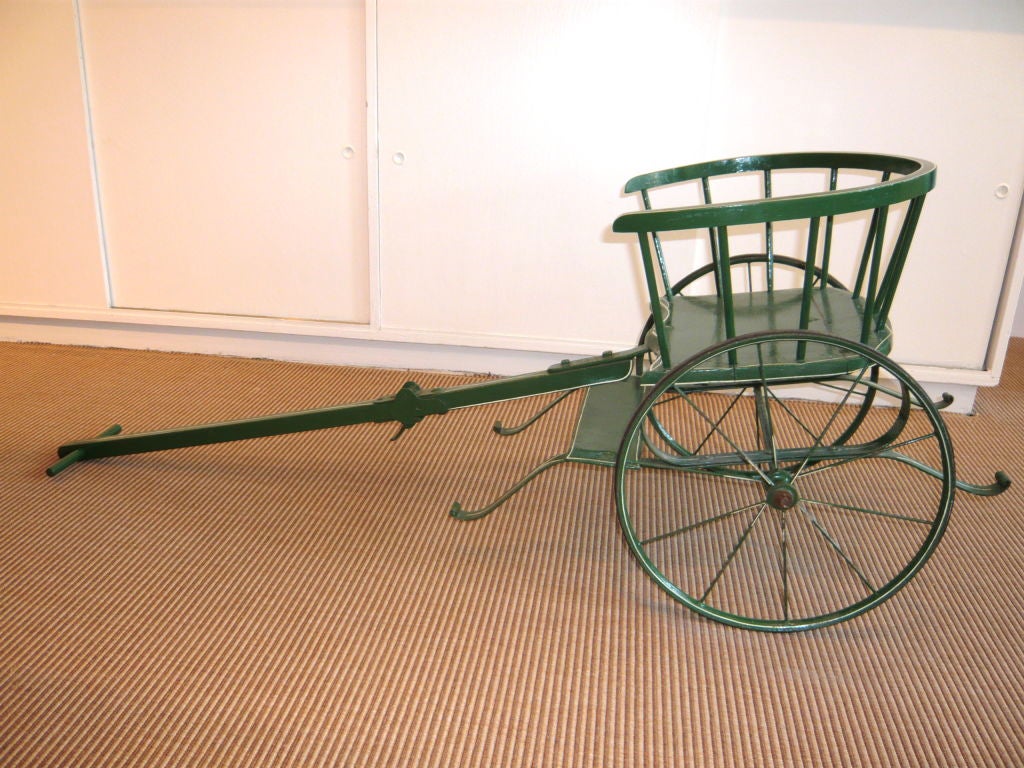 RARE ENGLISH 19TH CENTURY PAINTED DOG CART (DOG IS HITCHED IN FRONT AND PULLS SEATED CHILD.) HINGED IN THE MIDDLE OF THE 