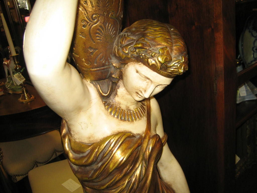 PAIR OF ITALIAN  FIGURAL TORCHERES