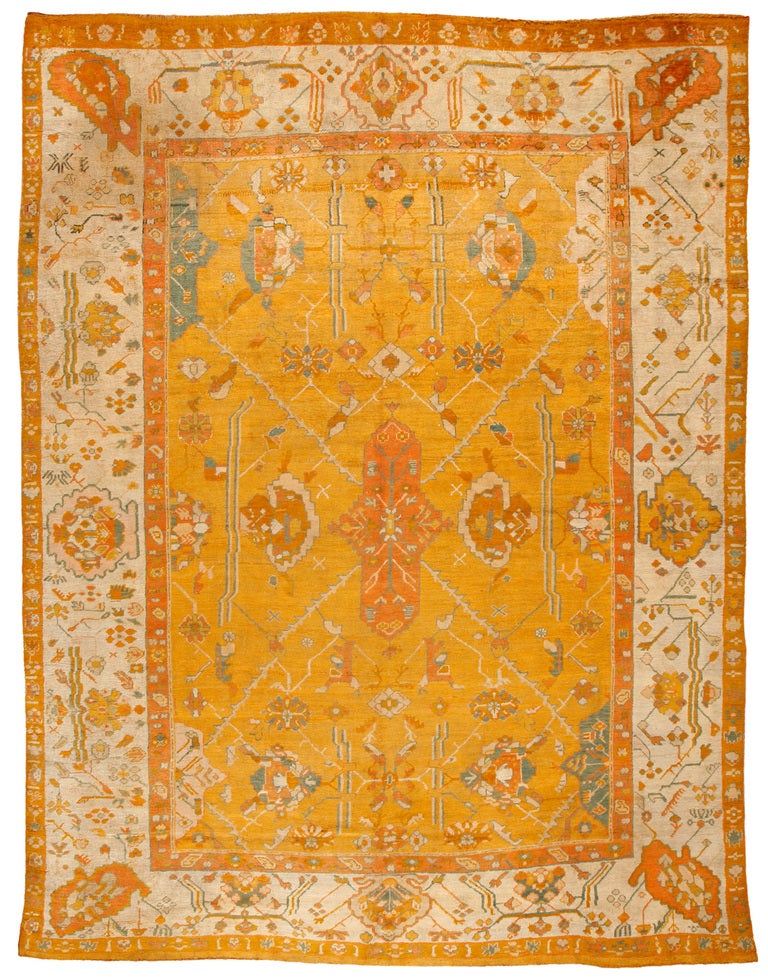 Antique mid-19th century Turkish Oushak carpet. Contact dealer.
Measures: 14 x 10.