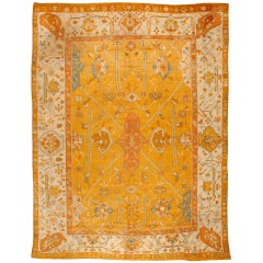Antique Mid-19th Century Turkish Oushak Carpet