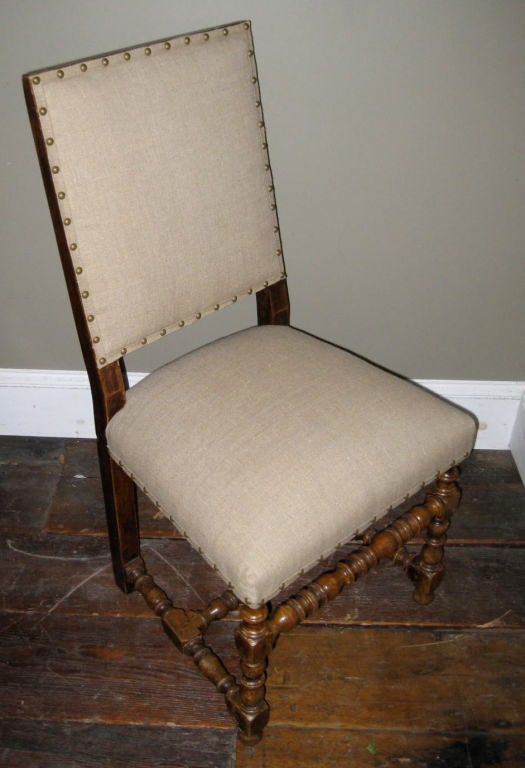 This set of six dining chairs have been recently reupholstered in vintage Belgian linen.<br />
There are decorative nail head accents throughout. Very comfortable chairs.