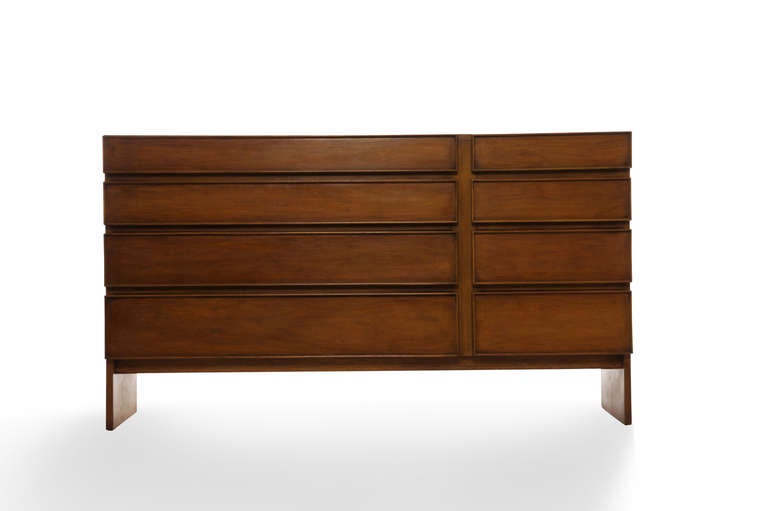 Moderne and Cubism meet this clean and sharp designed credenza/sideboard or dresser.  Clean design idea of the long and short framed drawers.  This can basically go into any room without question.  The photos show off the piece very well, but seeing