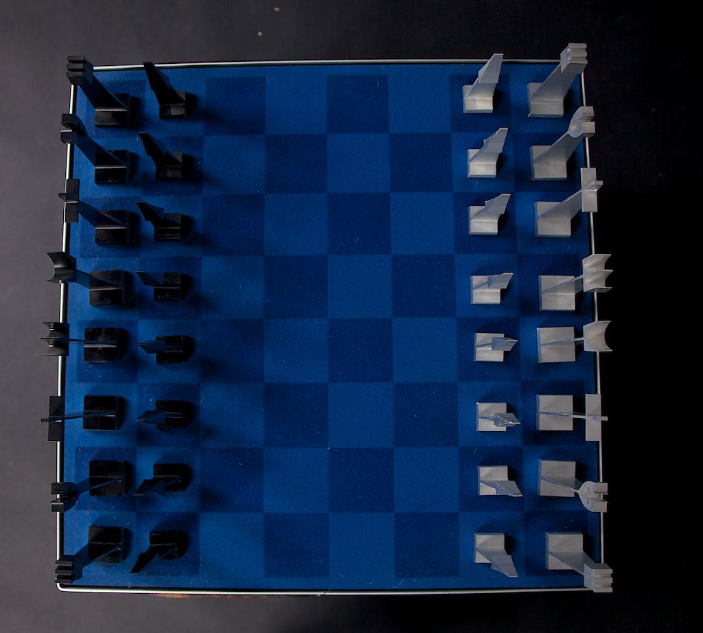 Striking hand spun aluminum modern chess set, in a great Industrial motif made by Austin Creations, from 1962. It is even more rare to have the board completing this set. A unique and wonderful gift for the chess player in your life, this set