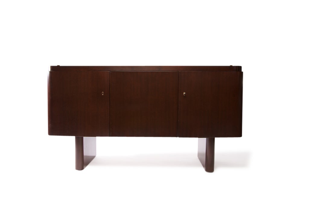 Impressive hard-to-find Art Deco German sideboard, Walnut exterior with five interior drawers and an interior adjustable shelf, in sycamore. This piece has a striking contrast with the sycamore and walnut, especially with the serving door left
