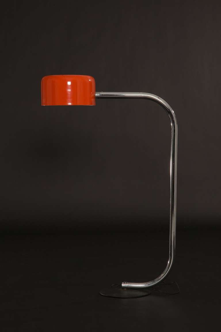Vibrant orange and chrome are always a great combination with this Robert Sonneman  designed floor lamp.  The chrome is in great condition as well as the original orange shade, never repainted and signed (see photo).  The chrome arch is attached to