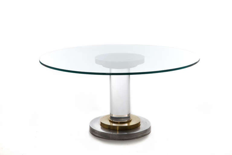 Italian designer, Romeo Rega worked with many materials to form this minimalist but commanding piece.  Made of spun aluminum, brass and thick clear perfect lucite.  We have the original 3/4